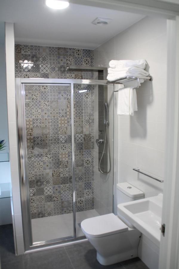 Baixo A Lua Rooming Sarria Buitenkant foto