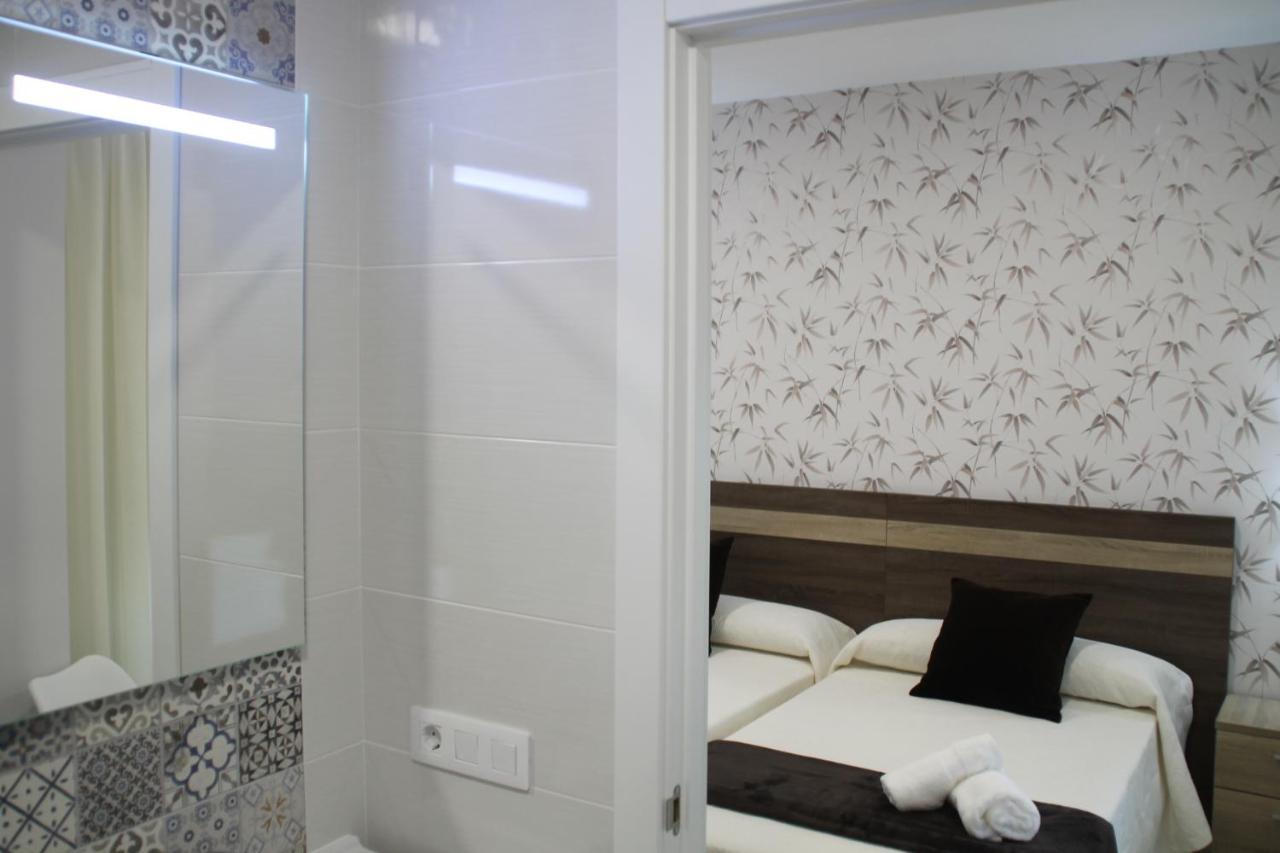 Baixo A Lua Rooming Sarria Buitenkant foto