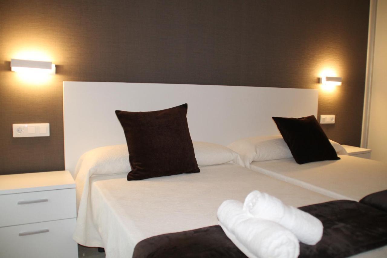 Baixo A Lua Rooming Sarria Buitenkant foto